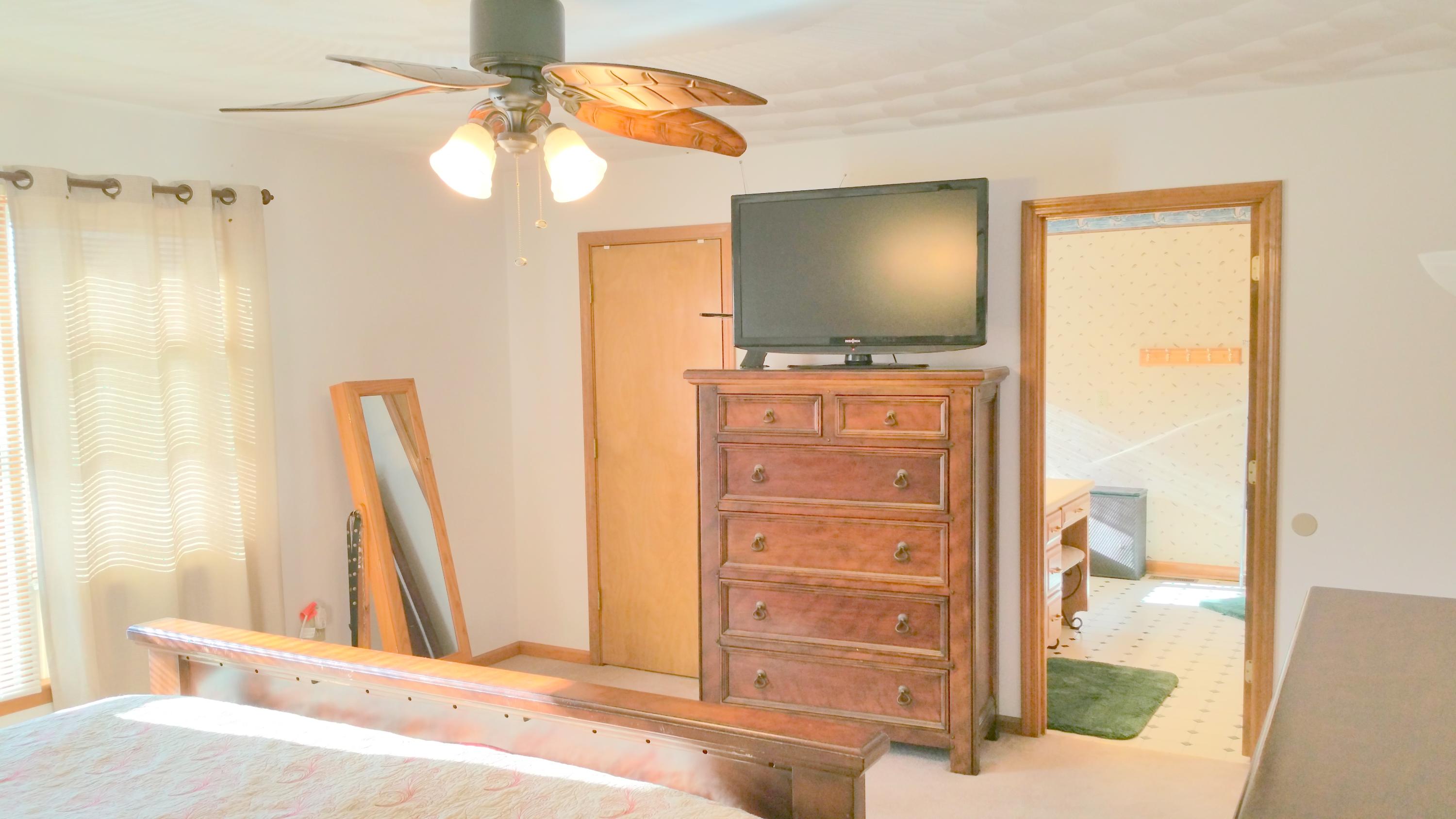1354 Archway Road Blue Ridge, VA 24064 - Photo 10 of 22 a view of a hallway with a flat screen tv