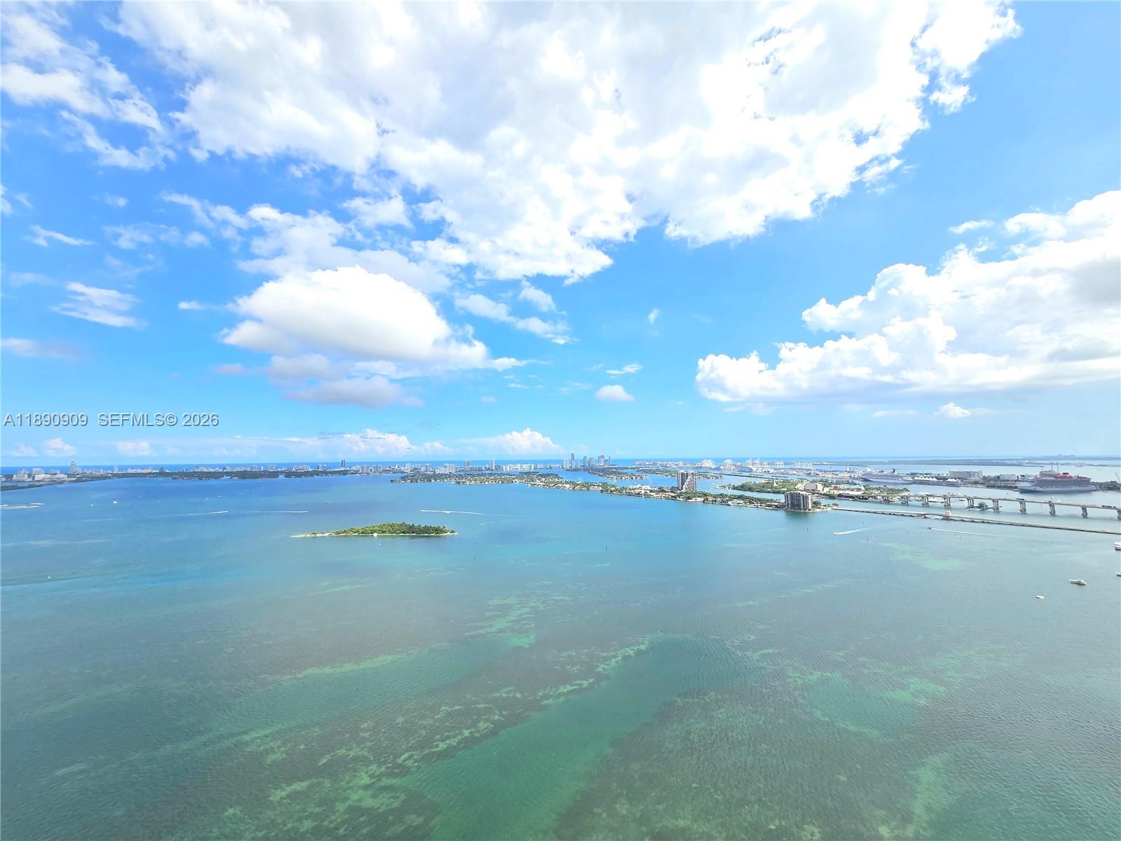 700 Northeast 24th Street, Unit 4004 Miami, FL 33137 - Photo 48 of 68 a view of city and ocean