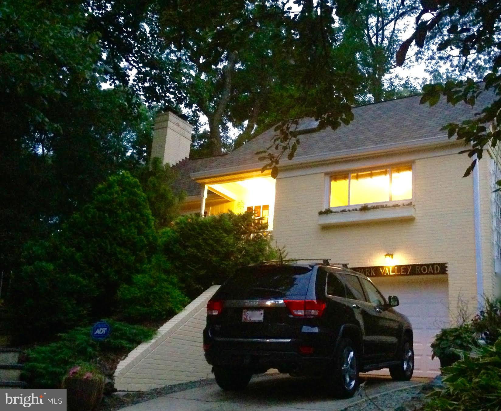 15 Park Valley Road Silver Spring, MD 20910 - Photo 1 of 30 a car parked in front of a house with yard