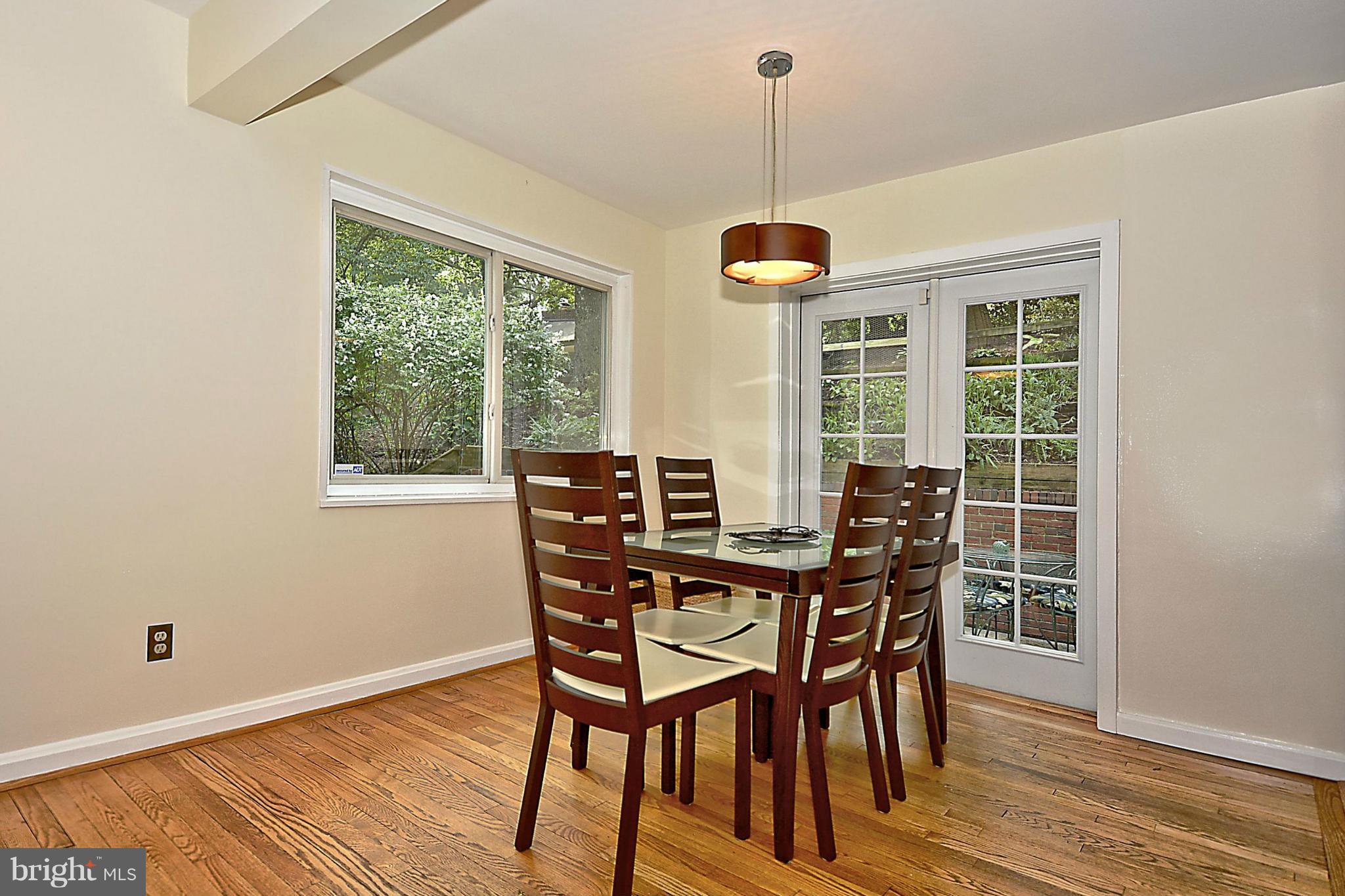 15 Park Valley Road Silver Spring, MD 20910 - Photo 10 of 30 a view of a dining room with furniture window and wooden floor