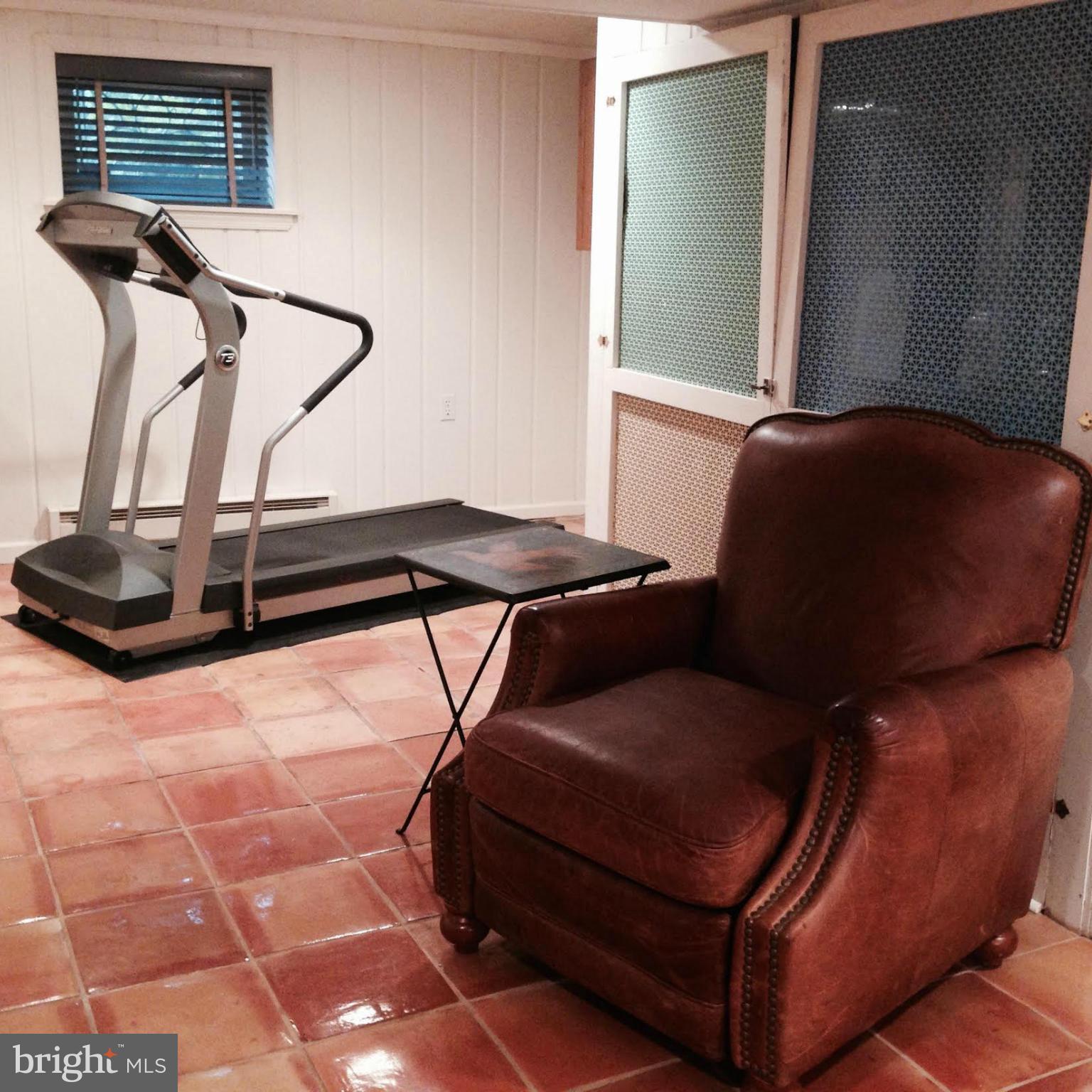 15 Park Valley Road Silver Spring, MD 20910 - Photo 23 of 30 a living room with furniture gym equipment