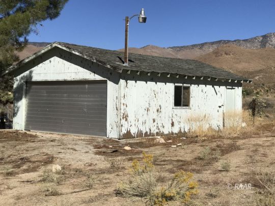 5690 South Kelso Valley Road Weldon, CA 93283 - Photo 15 of 17 a view of a house with a snow
