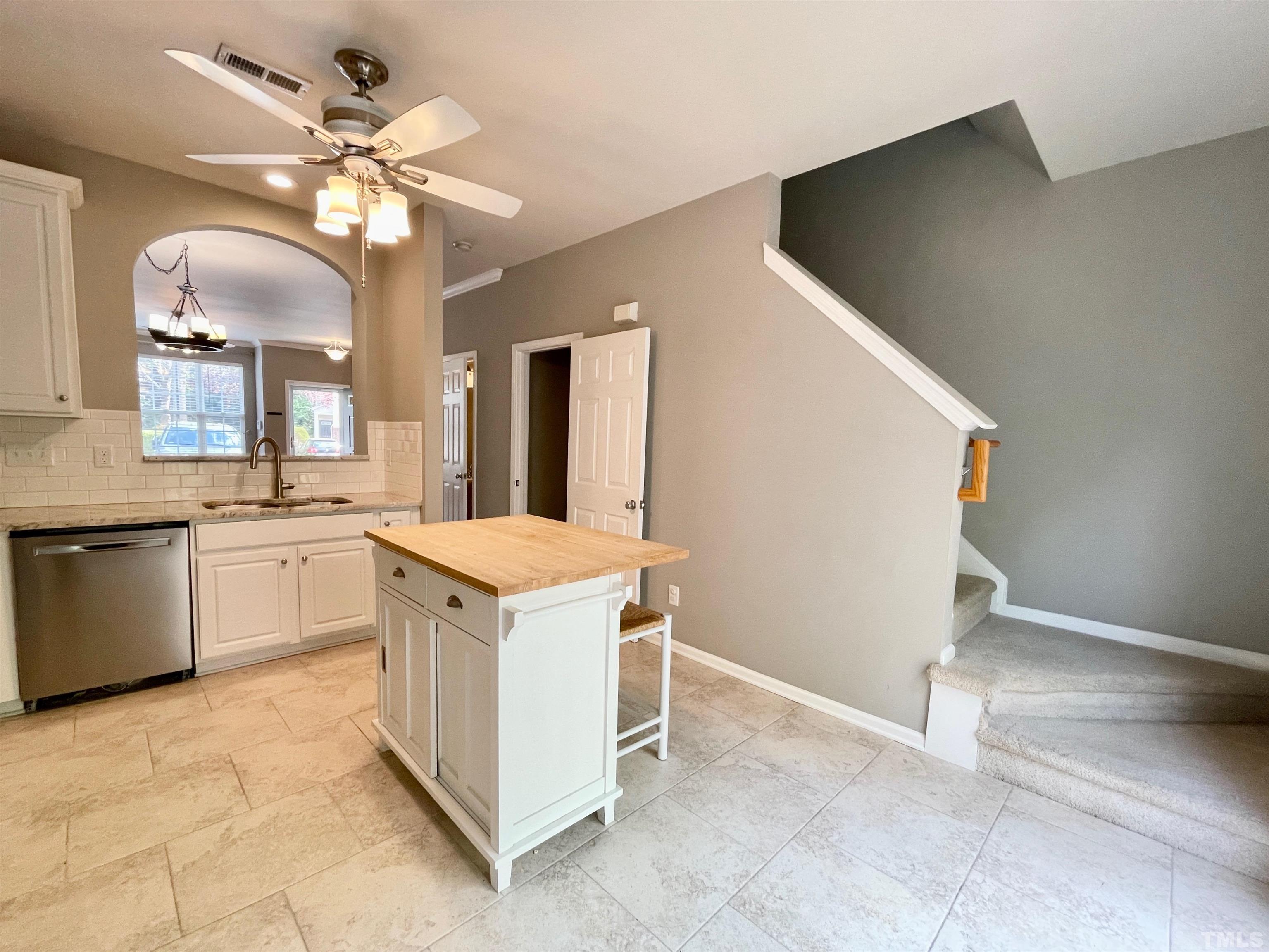 8467 Reedy Ridge Lane Raleigh, NC 27613 - Photo 17 of 46 a view of a kitchen cabinets and a stove