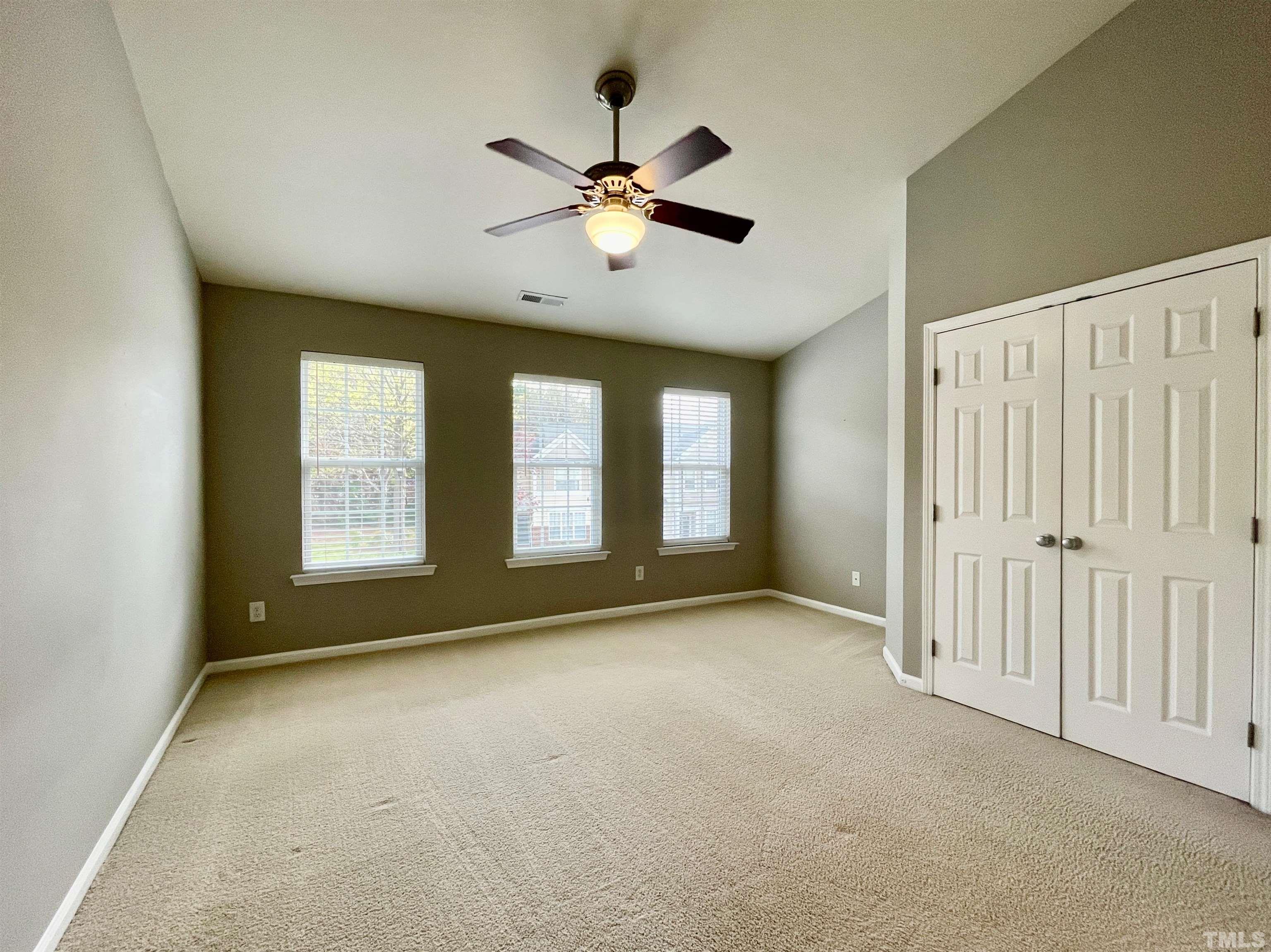 8467 Reedy Ridge Lane Raleigh, NC 27613 - Photo 31 of 46 a view of an empty room with a window