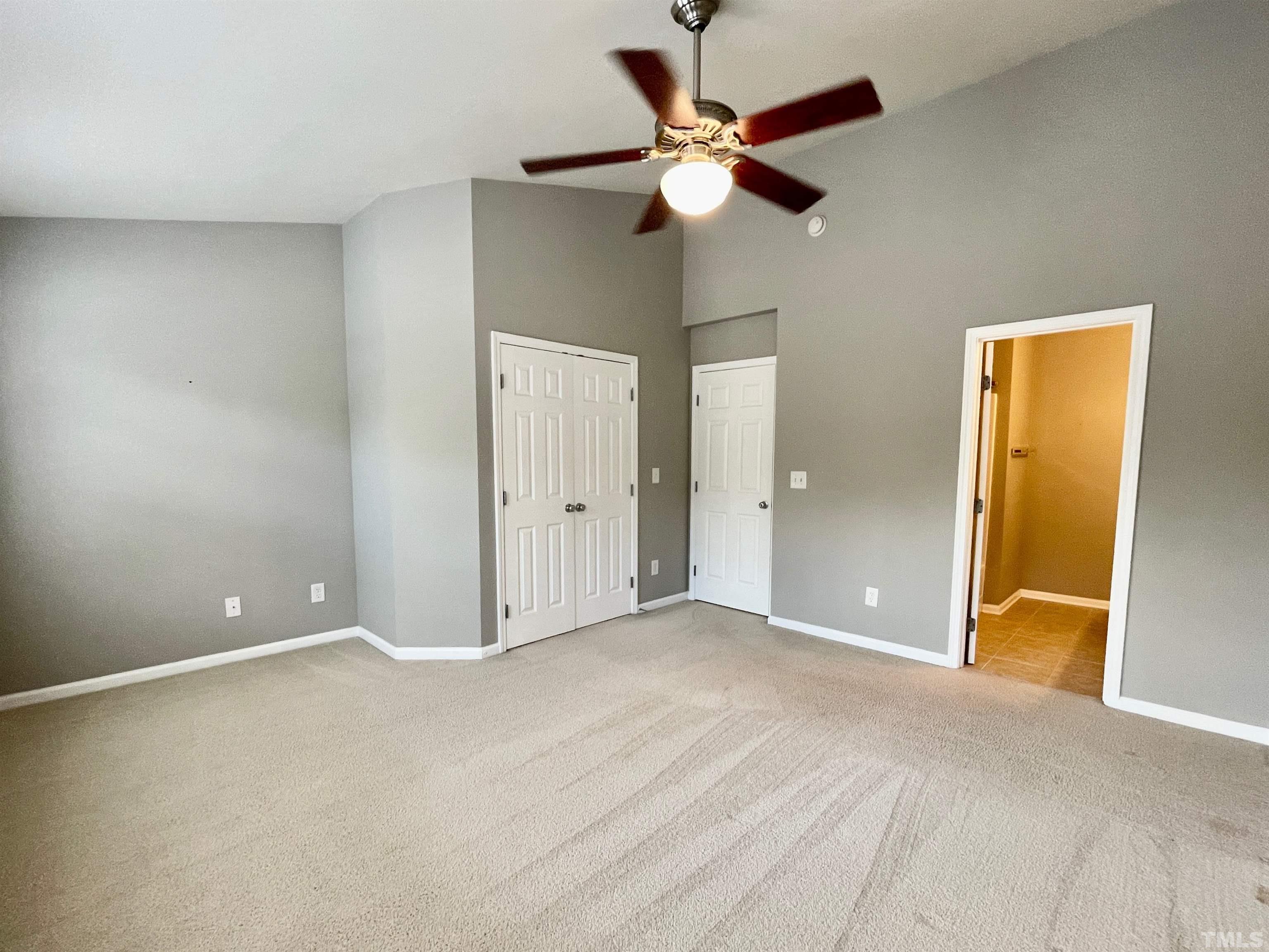 8467 Reedy Ridge Lane Raleigh, NC 27613 - Photo 32 of 46 a view of room with window and ceiling fan