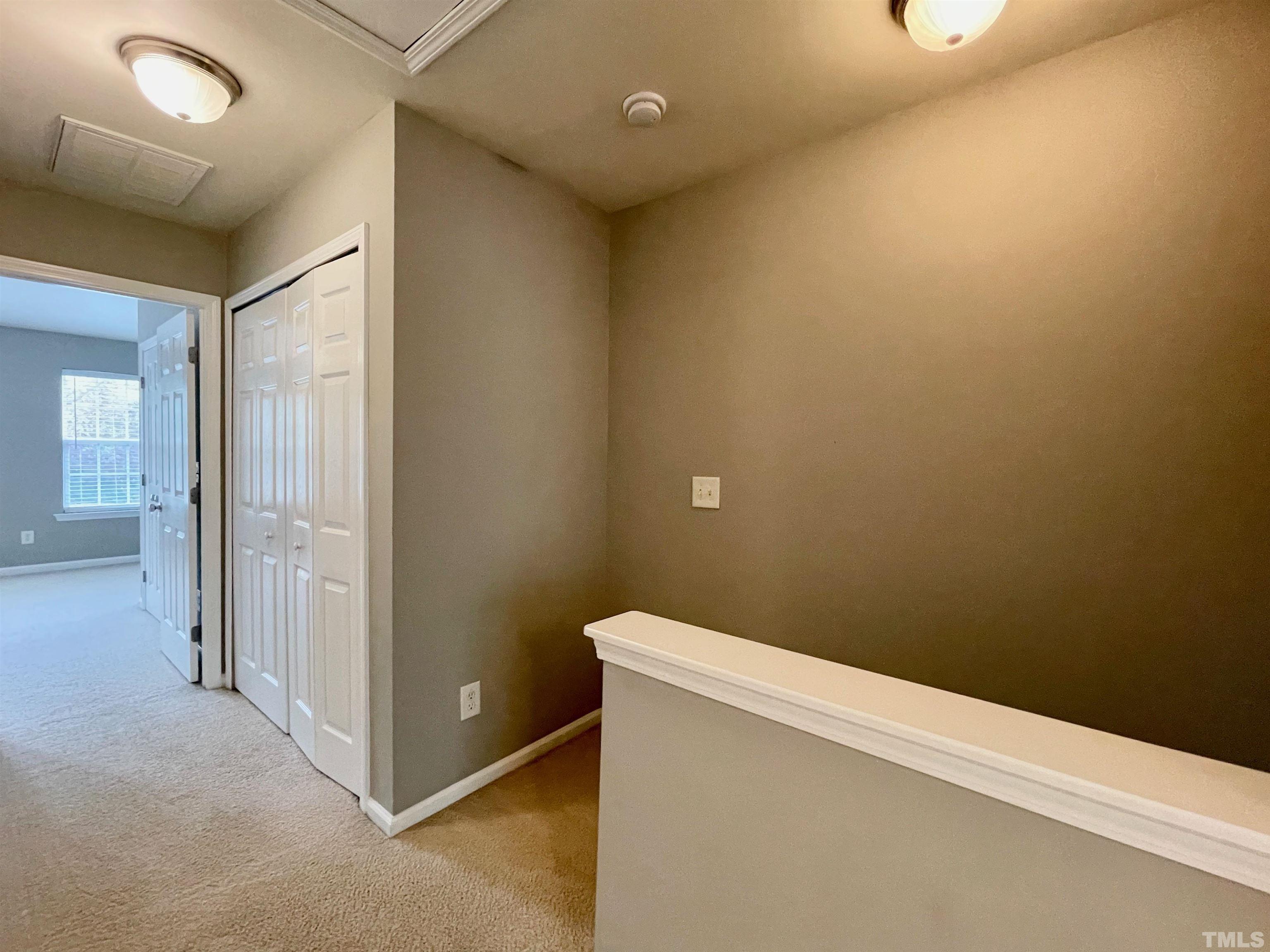8467 Reedy Ridge Lane Raleigh, NC 27613 - Photo 36 of 46 a view of a hallway