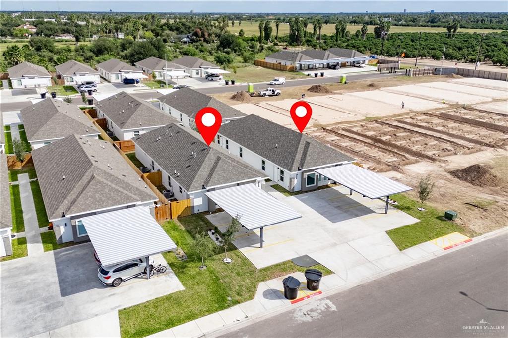 1408 South Xanthia Street, Unit 1 Alton, TX 78573 - Photo 14 of 19 an aerial view of a house with swimming pool