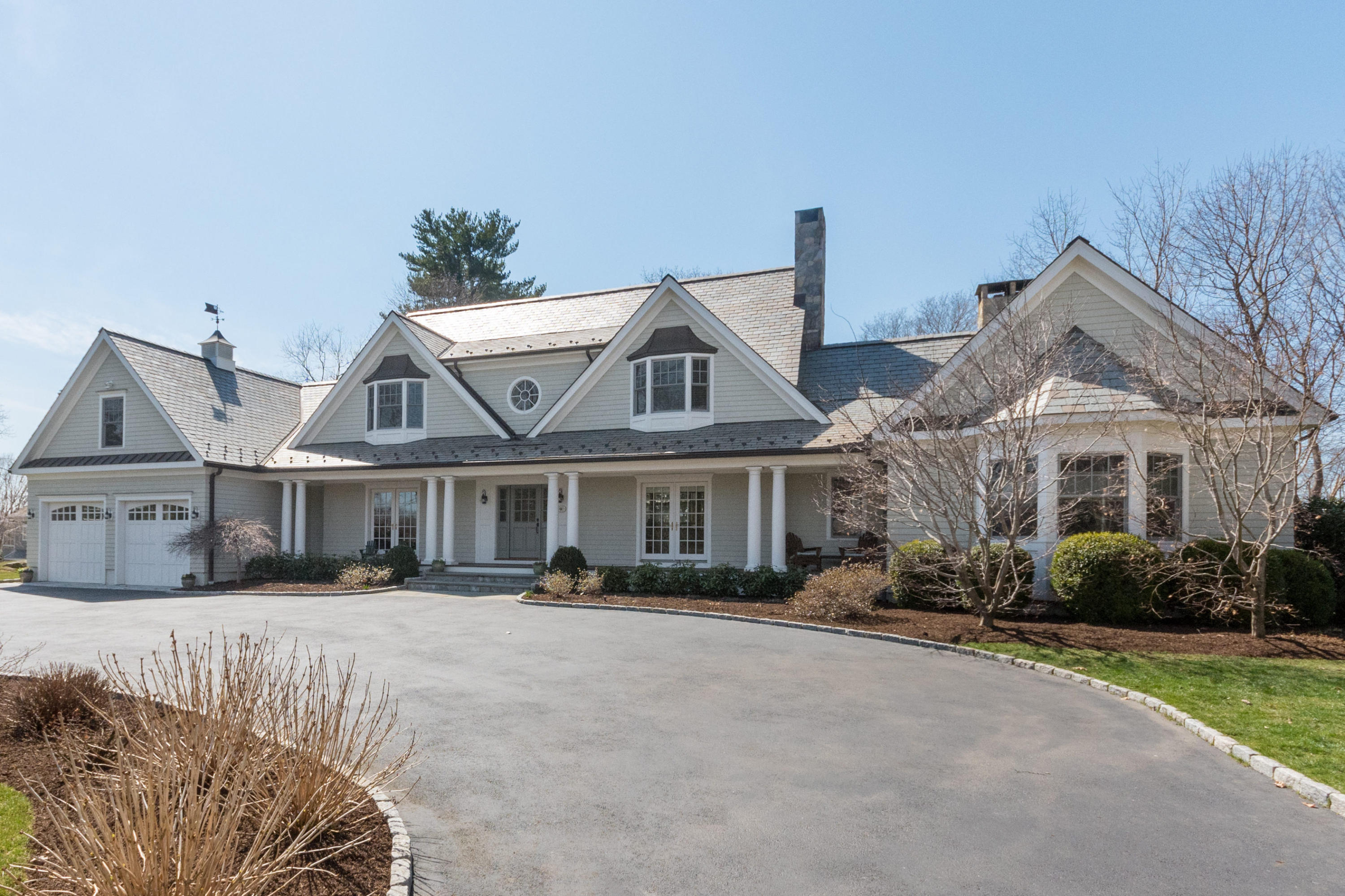 3 Juniper Road Darien, CT 06820 - Photo 1 of 1 a front view of a house with a garden