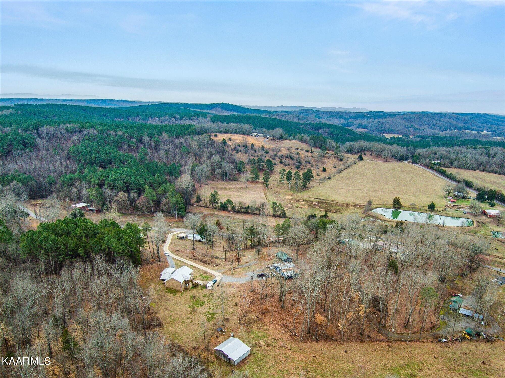 1190 Wilson Hollow Road Decatur, TN 37322 - Photo 34 of 36 an aerial view of a house with a yard