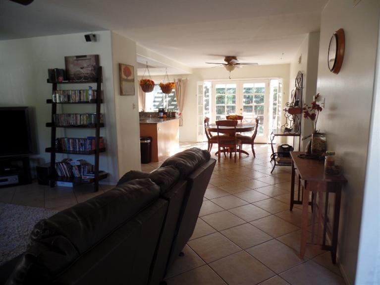1310 Meadowbrook Road Ojai, CA 93023 - Photo 3 of 14 a living room with furniture and a flat screen tv