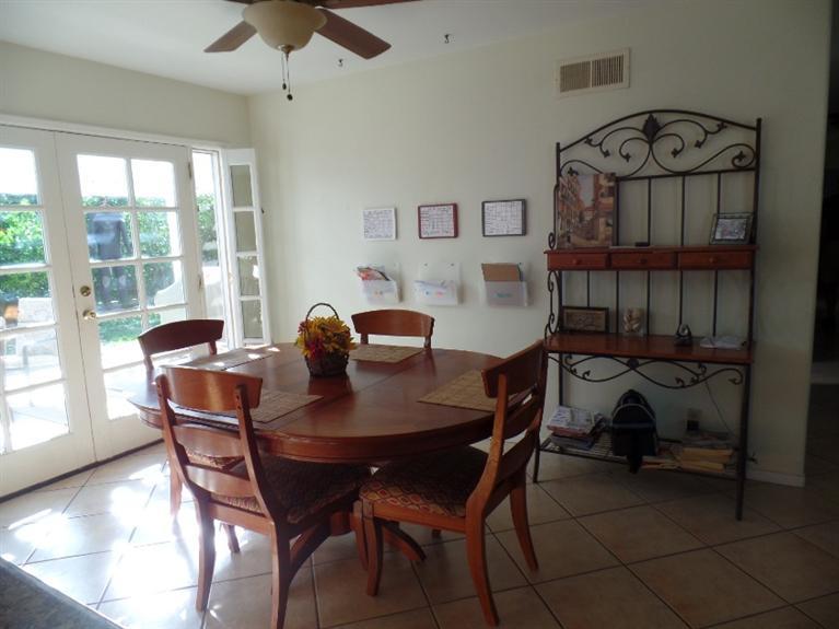 1310 Meadowbrook Road Ojai, CA 93023 - Photo 6 of 14 a view of a dining room with furniture window and outside view