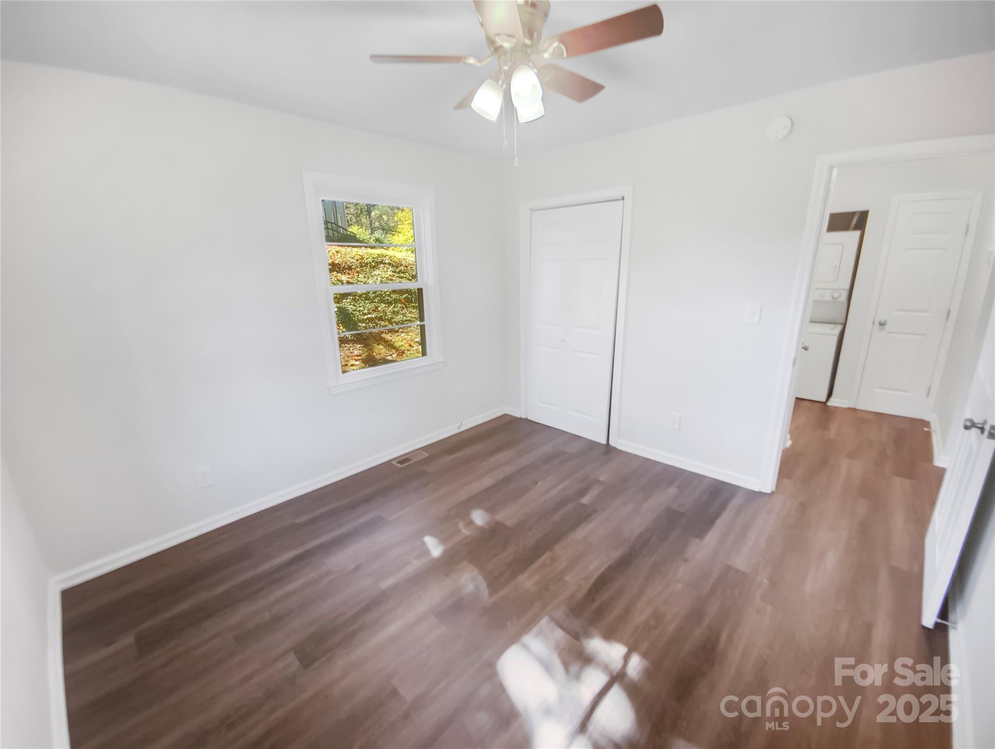349 Wakefield Drive, Unit A Charlotte, NC 28209 - Photo 16 of 20 a view of empty room with wooden floor