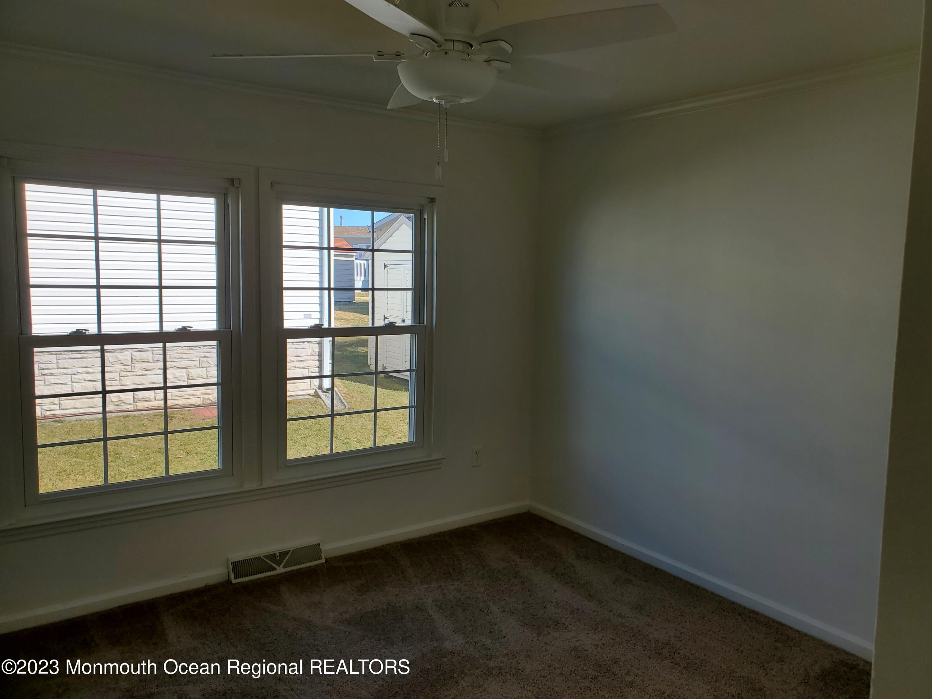 29 Pine Ridge Boulevard Whiting, NJ 08759 - Photo 14 of 29 an empty room with a window