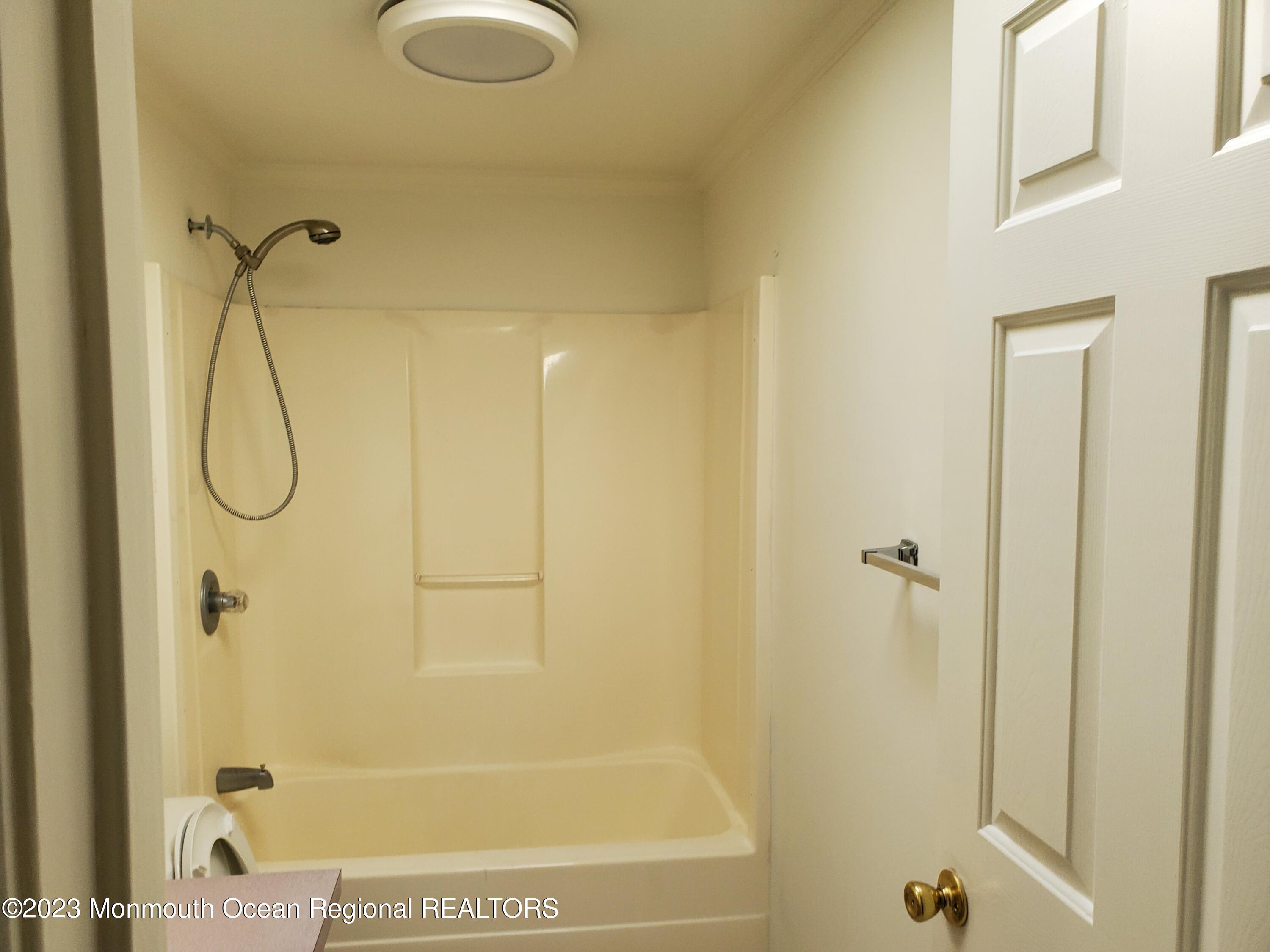 29 Pine Ridge Boulevard Whiting, NJ 08759 - Photo 17 of 29 a bathroom with a shower