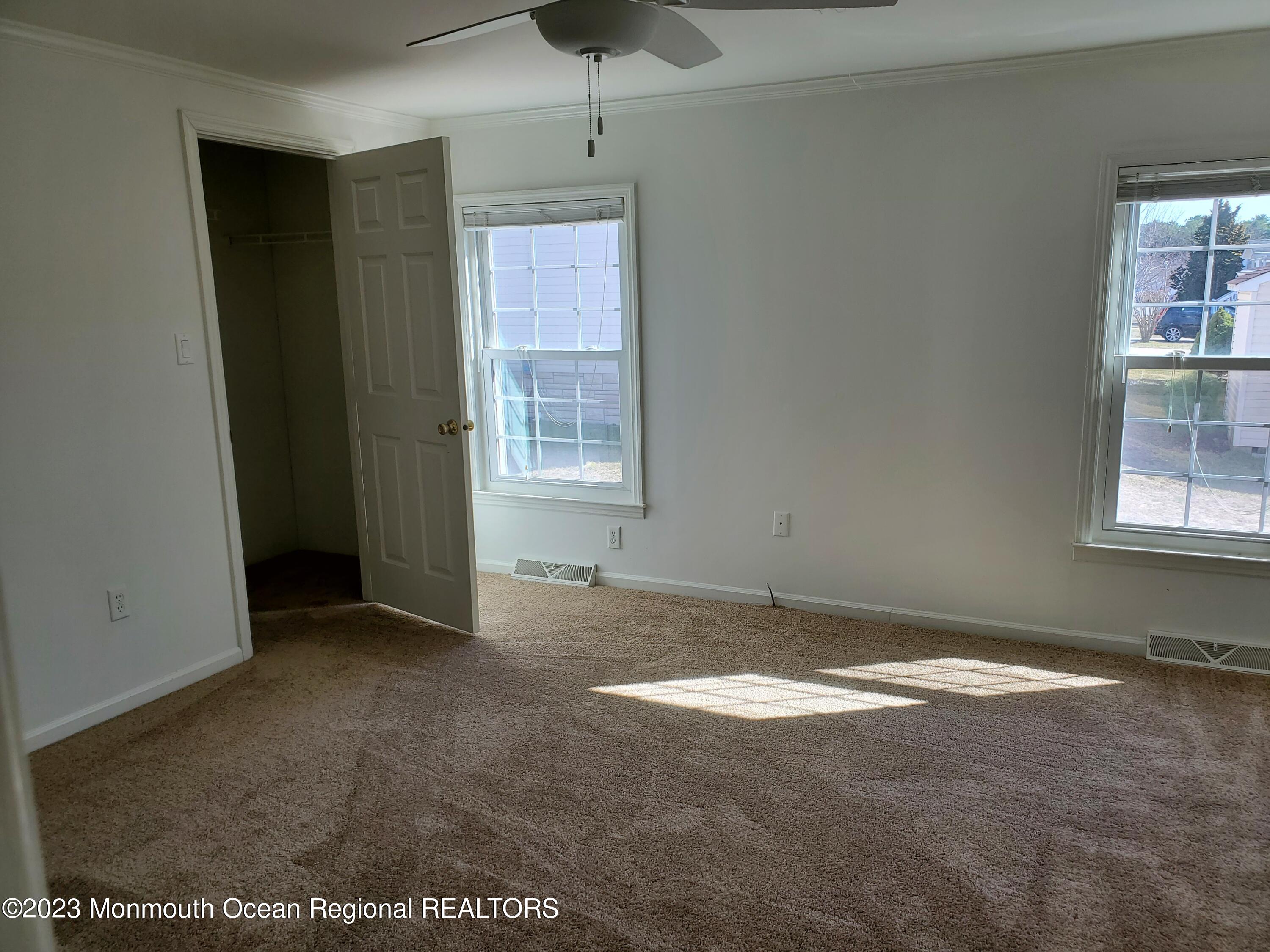 29 Pine Ridge Boulevard Whiting, NJ 08759 - Photo 22 of 29 an empty room with windows