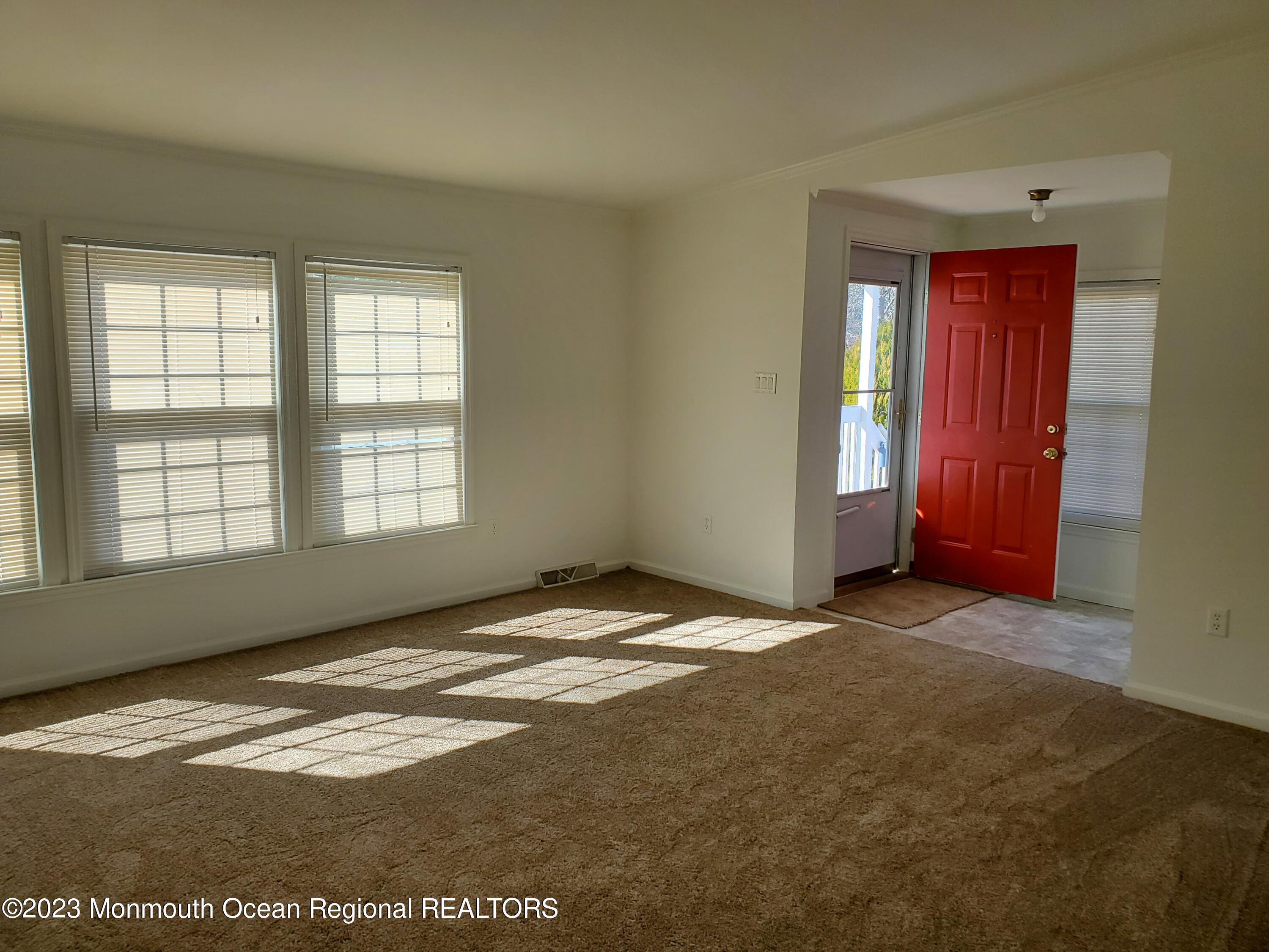 29 Pine Ridge Boulevard Whiting, NJ 08759 - Photo 3 of 29 a view of an empty room with window