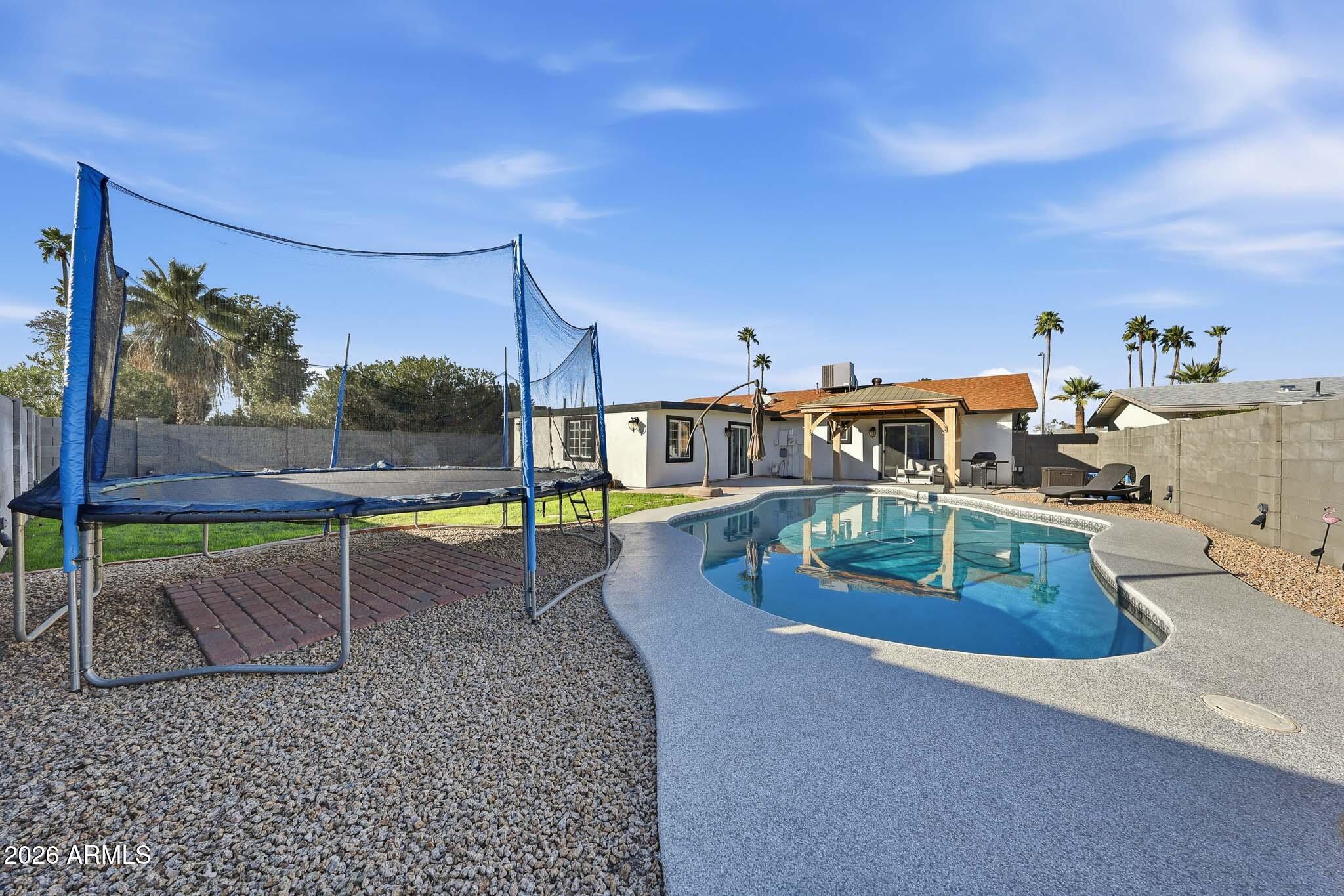 3317 East Bloomfield Road Phoenix, AZ 85032 - Photo 7 of 45 swimming pool view with a outdoor space