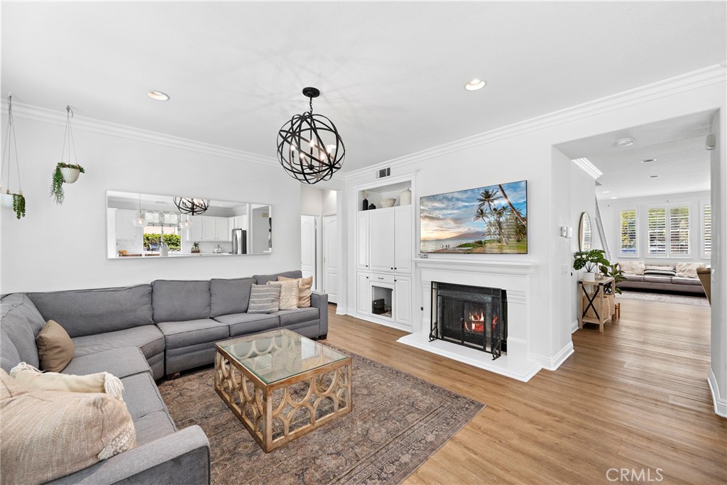 14 Celestine Circle Ladera Ranch, CA 92694 - Photo 11 of 42 a living room with furniture and a fireplace