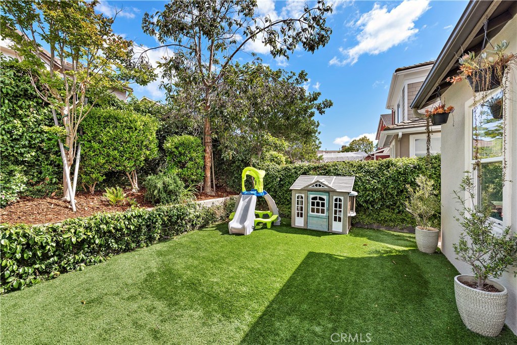 14 Celestine Circle Ladera Ranch, CA 92694 - Photo 36 of 42 a view of a garden with plants and large trees