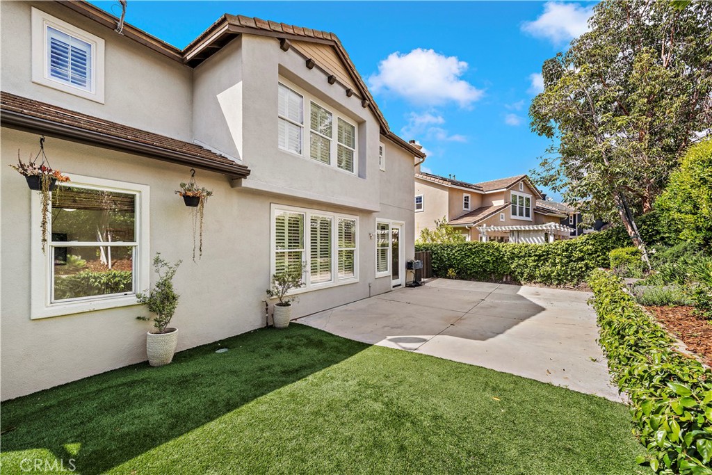 14 Celestine Circle Ladera Ranch, CA 92694 - Photo 37 of 42 a front view of a house with a yard and porch