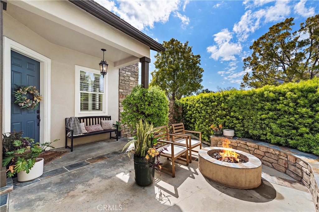 14 Celestine Circle Ladera Ranch, CA 92694 - Photo 4 of 42 a backyard of a house with fountain and outdoor seating