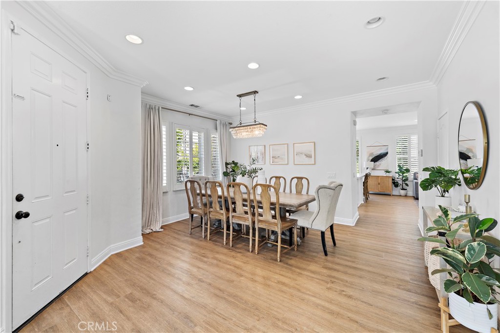 14 Celestine Circle Ladera Ranch, CA 92694 - Photo 5 of 42 a view of a dining room with furniture and wooden floor
