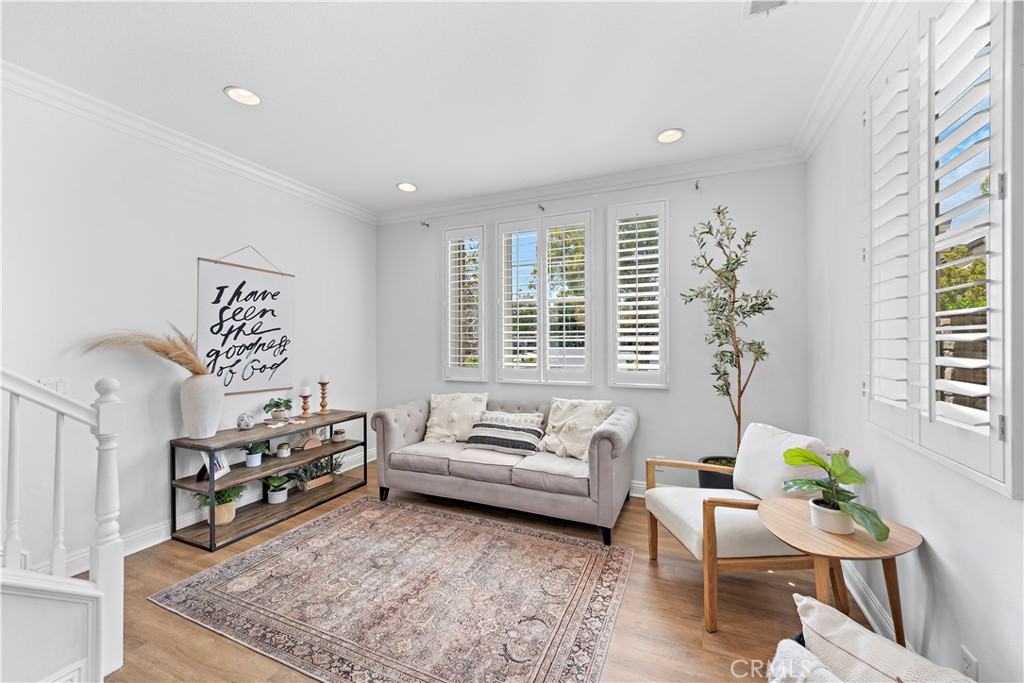 14 Celestine Circle Ladera Ranch, CA 92694 - Photo 7 of 42 a living room with furniture and a flat screen tv