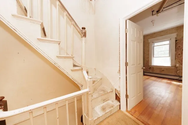 a view of front door with stairs