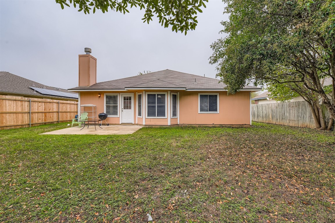 441 Keystone Loop Kyle, TX 78640 - Photo 17 of 17 a front view of a house with garden