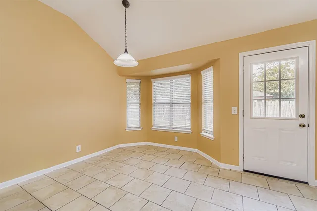 a view of an empty room with window