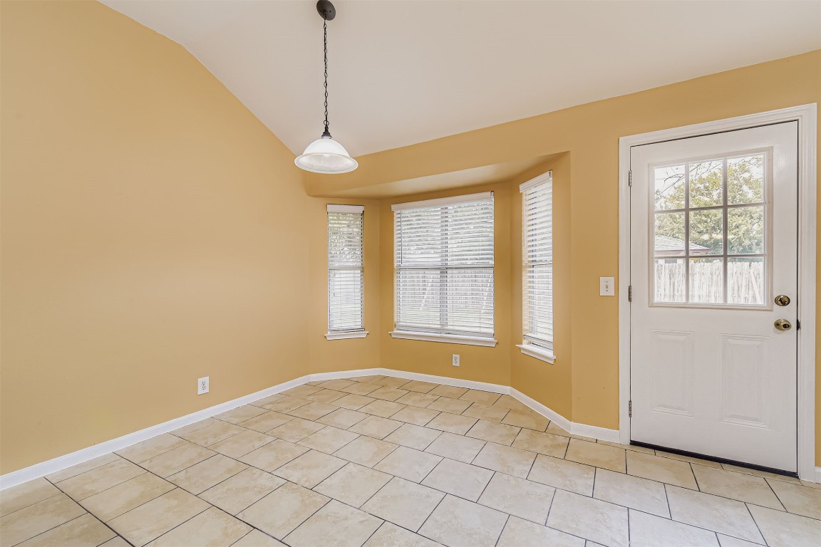 441 Keystone Loop Kyle, TX 78640 - Photo 2 of 17 a view of an empty room with window