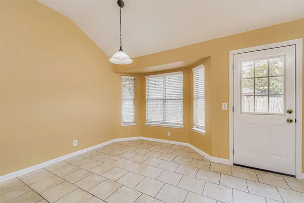 a view of an empty room with window