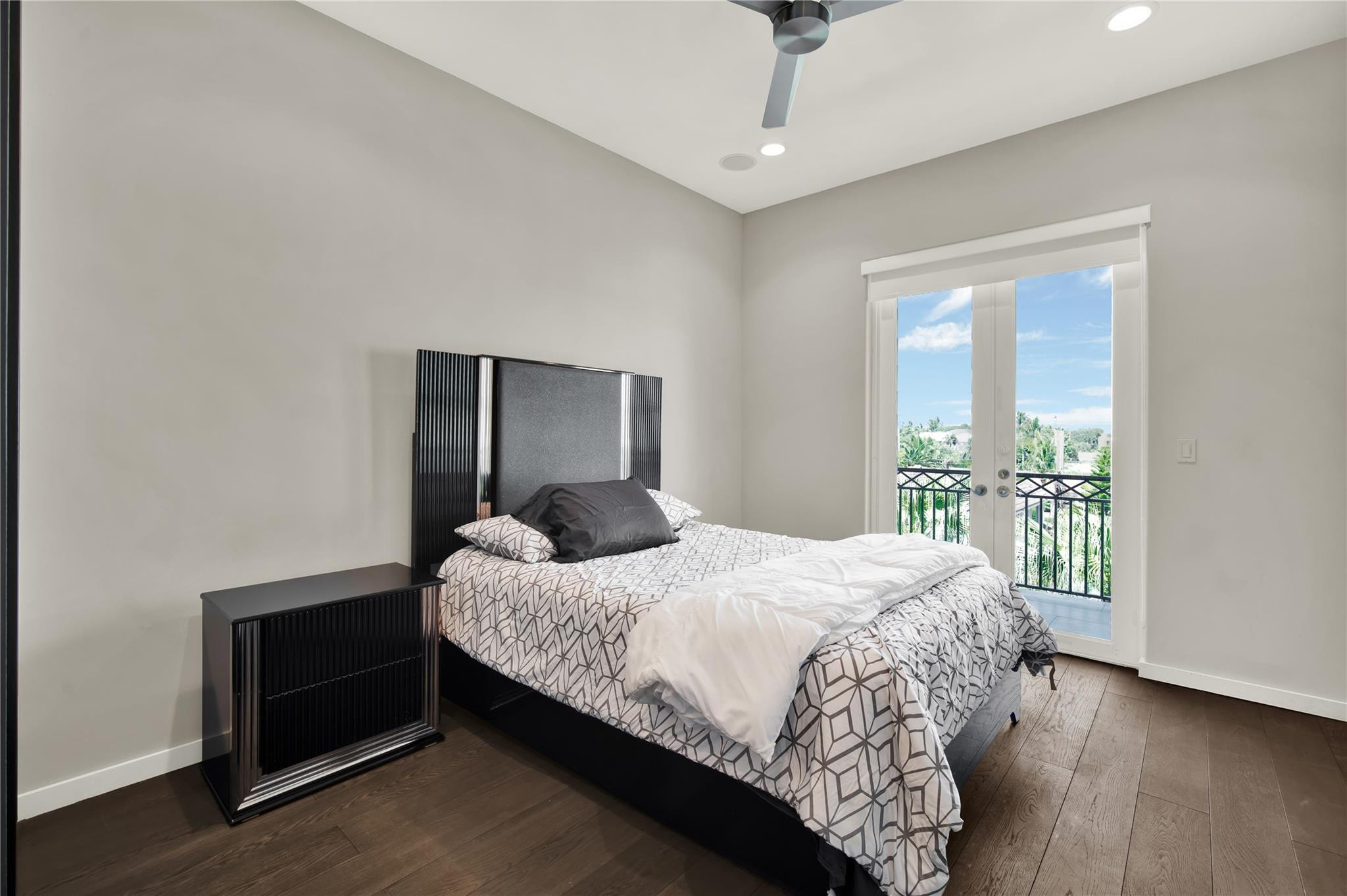 425 North Ocean Boulevard, Unit 3 Boca Raton, FL 33432 - Photo 50 of 69 a bedroom with a bed and a large window