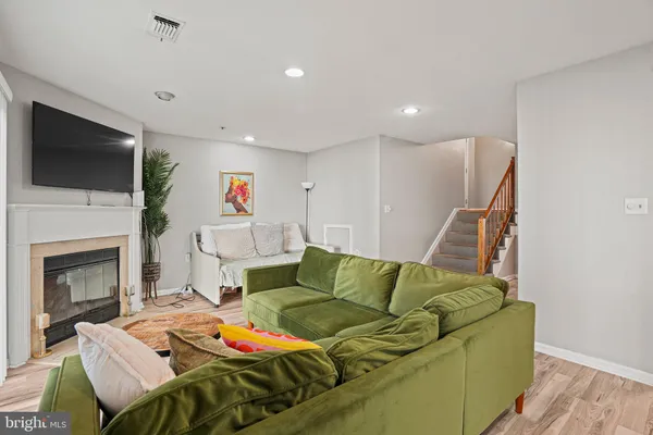 a living room with a couch and a flat screen tv