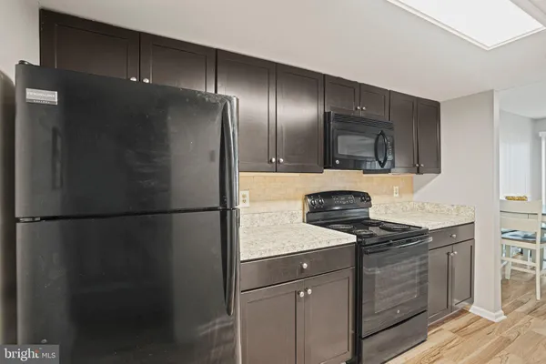 a bathroom with a sink double vanity and a mirror