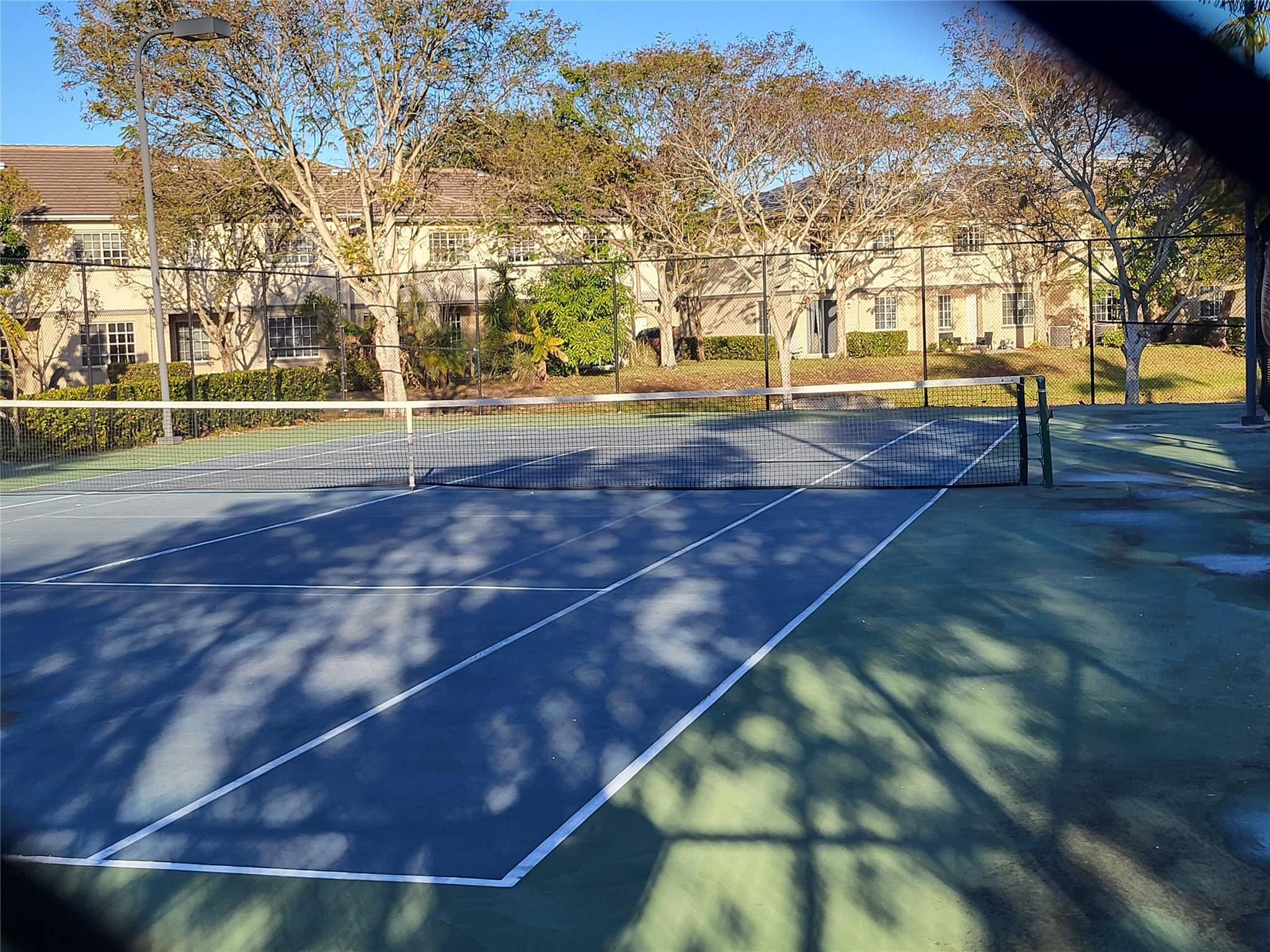 1957 Freeport Drive, Unit 1957 Riviera Beach, FL 33404 - Photo 11 of 14 a view of an outdoor space and yard