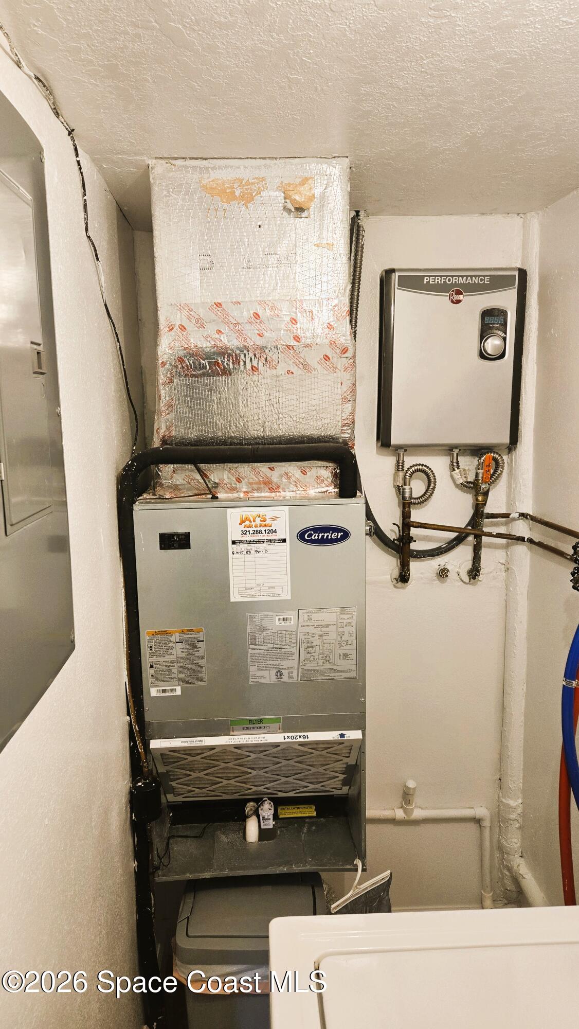 412 School Road, Unit 88 Indian Harbour Beach, FL 32937 - Photo 37 of 50 AC & new Tankless water heater