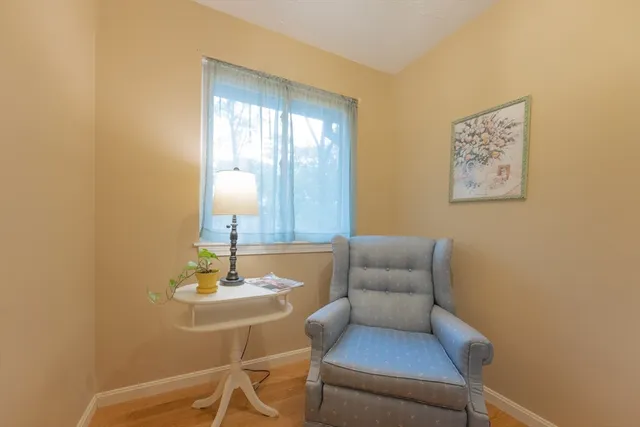 a bathroom with a sink a toilet and shower curtain