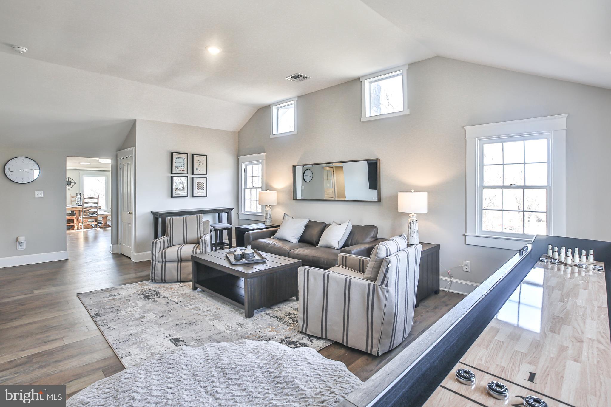 17345 Raven Rocks Road Bluemont, VA 20135 - Photo 75 of 99 a living room with furniture and a couch