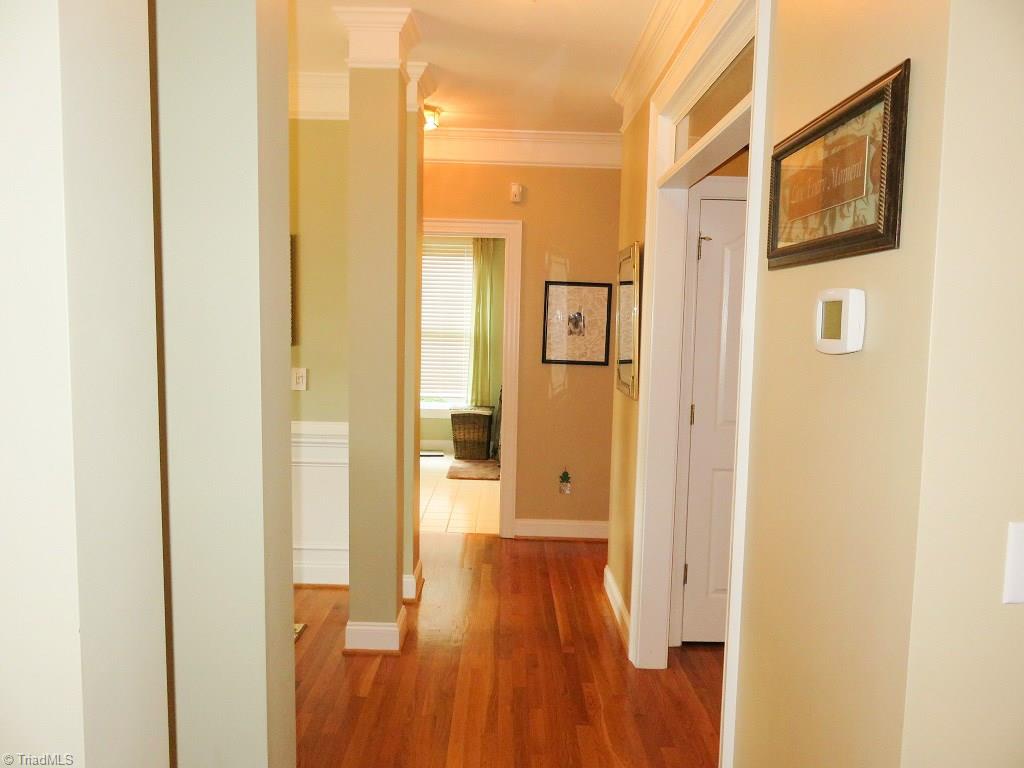 5404 Dobson Road Greensboro, NC 27410 - Photo 30 of 30 Split bedroom floorplan - hallway leading to two additional bedrooms and 2nd full bath. Dining is to the left, kitchen to the right