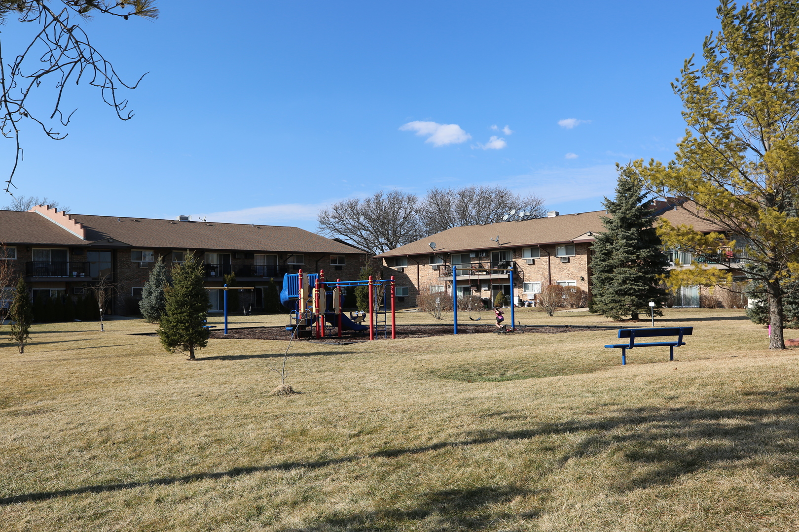 832 East Old Willow Road, Unit 105 Prospect Heights, IL 60070 - Photo 14 of 15 a view of a swimming pool with lawn chairs under an umbrella
