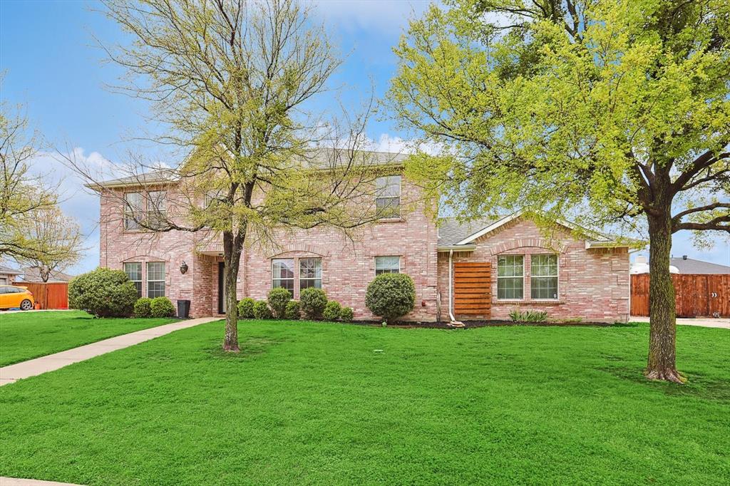 1016 Ridgetop Drive Justin, TX 76247 - Photo 2 of 40 Traditional home featuring brick siding