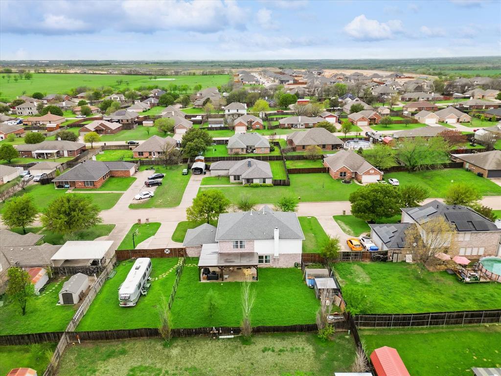 1016 Ridgetop Drive Justin, TX 76247 - Photo 40 of 40 Aerial perspective of suburban area