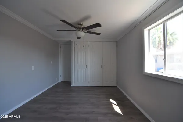 a view of an empty room and window