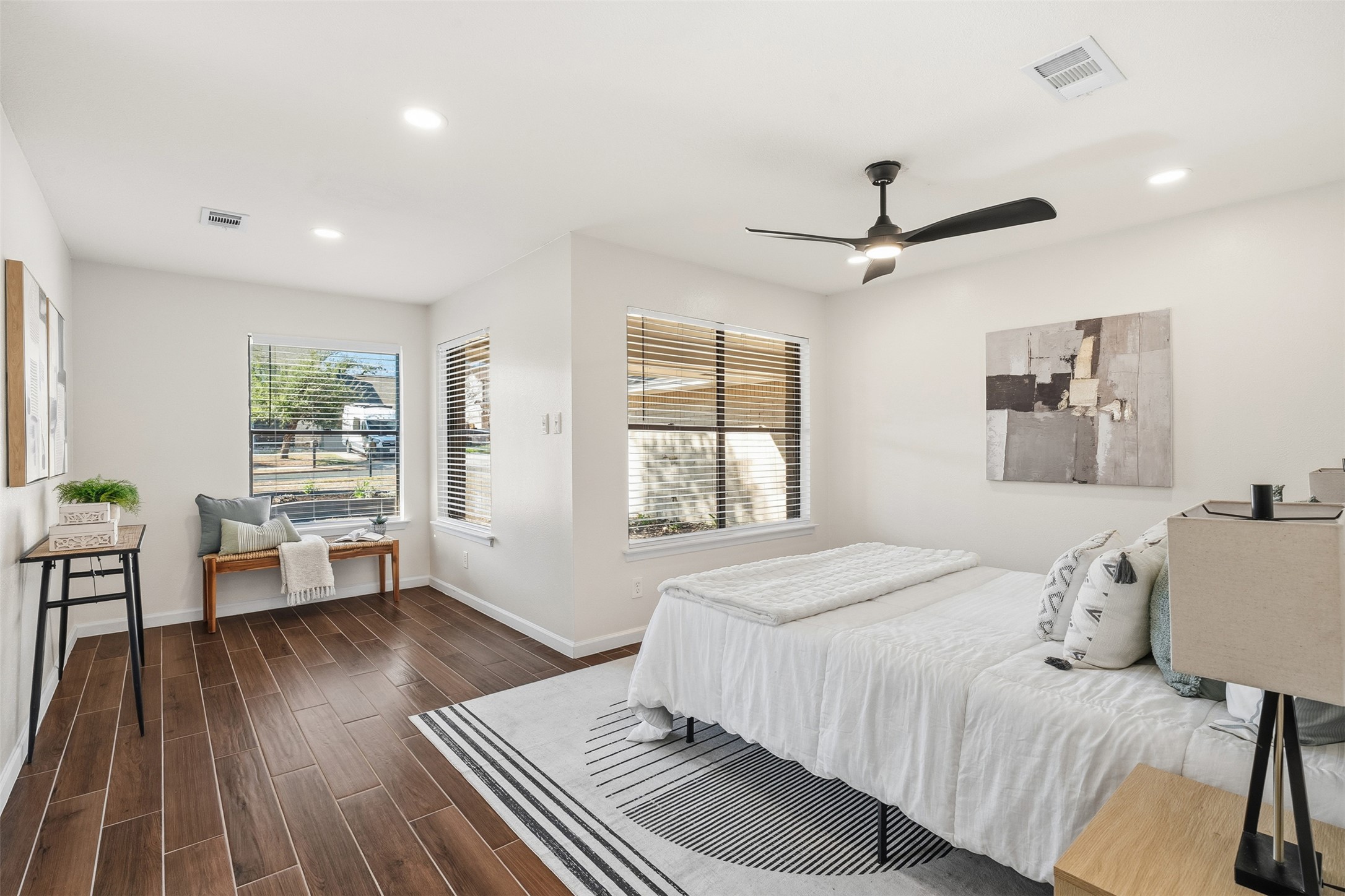 12401 Rusted Nail Cove Austin, TX 78750 - Photo 18 of 34 Bedroom with wood tiled floors, recessed lighting, and a ceiling fan