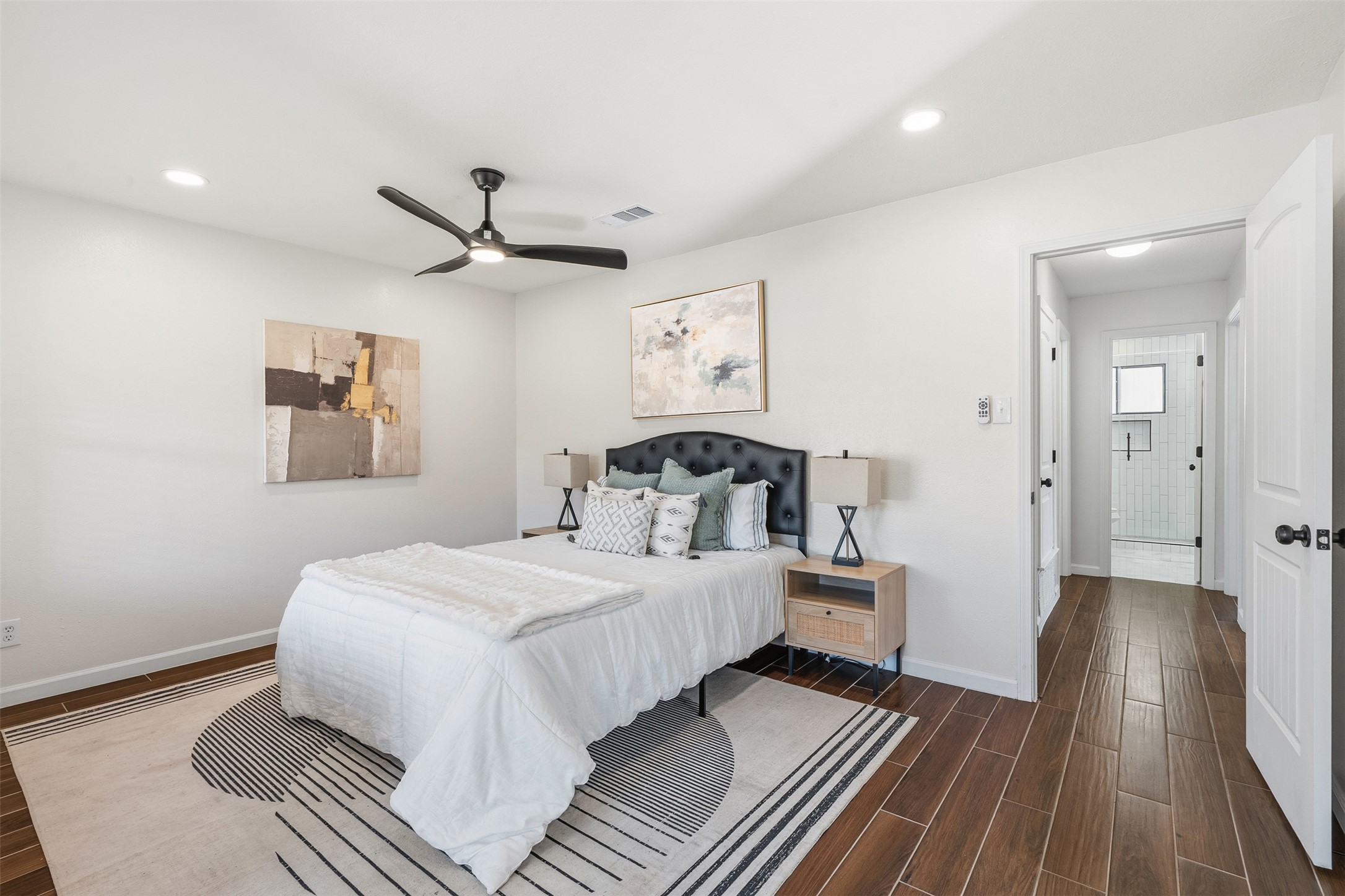 12401 Rusted Nail Cove Austin, TX 78750 - Photo 21 of 34 Bedroom with wood finish floors, ceiling fan, and recessed lighting