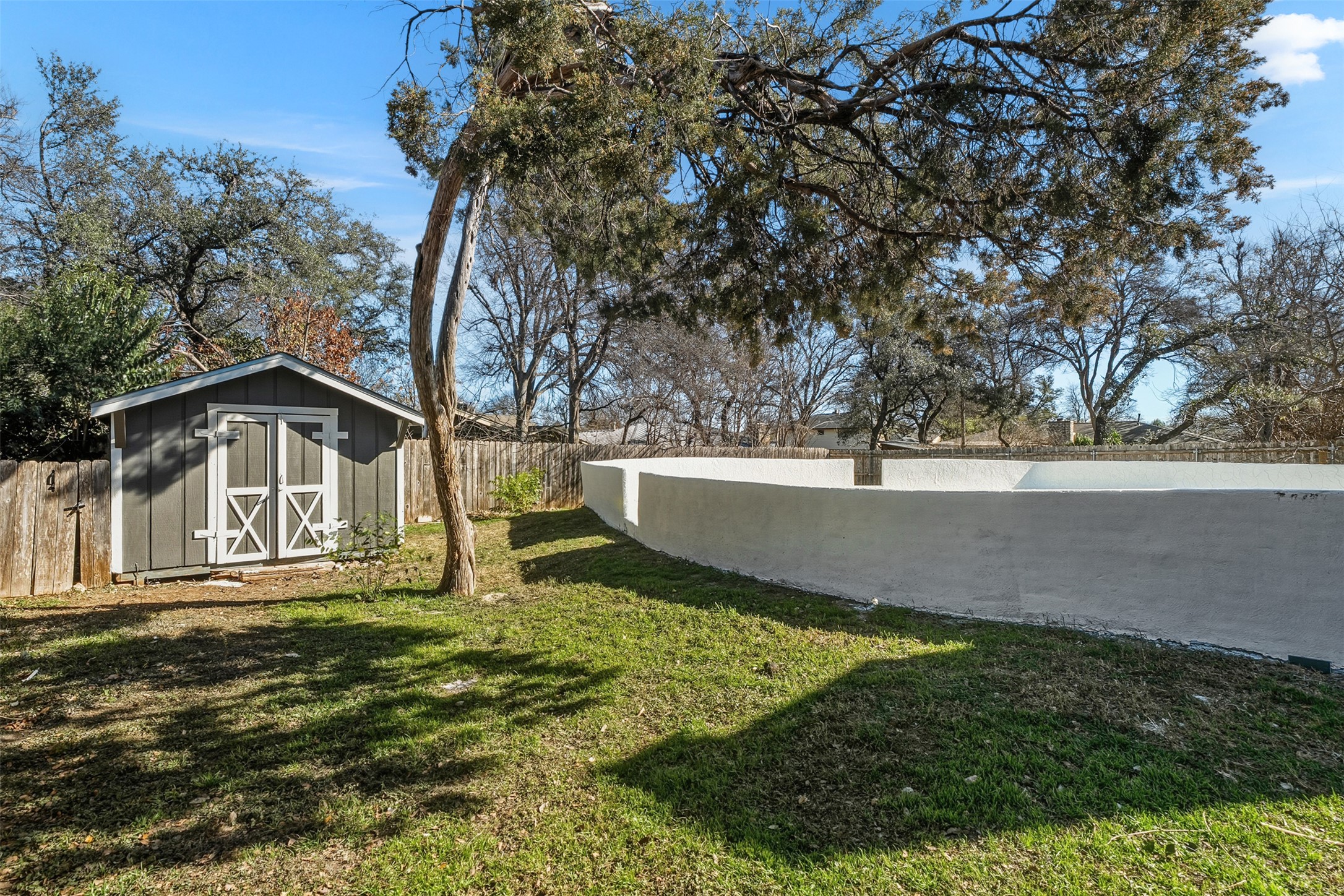 12401 Rusted Nail Cove Austin, TX 78750 - Photo 32 of 34 Fenced backyard featuring a shed