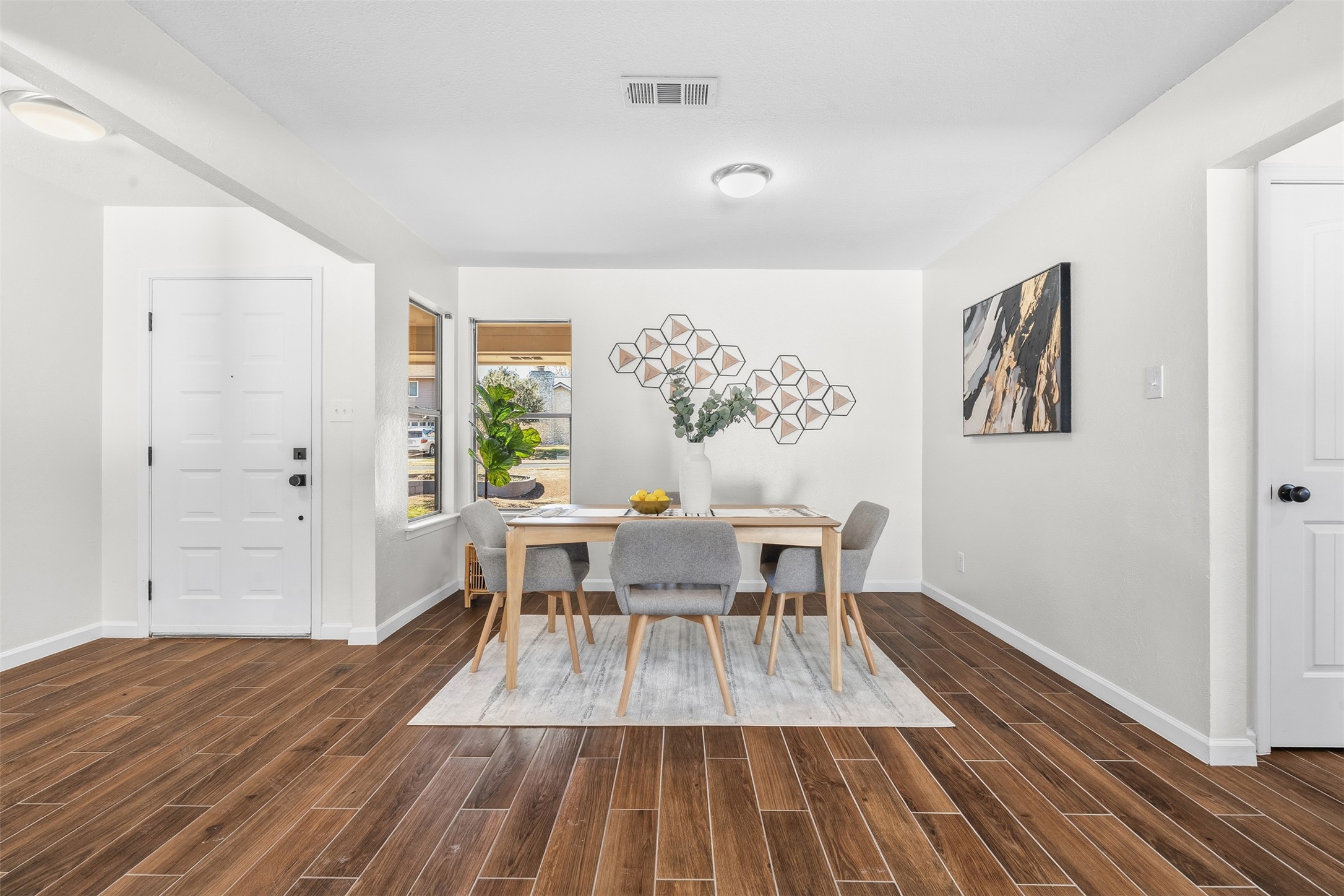 12401 Rusted Nail Cove Austin, TX 78750 - Photo 8 of 34 Dining space featuring wood finish floors
