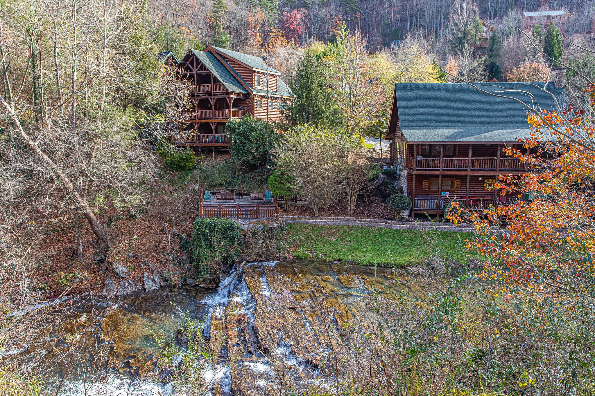 64 Smoky Ridge Way Sevierville, TN 37862 - Photo 4 of 12 a view of a house with a yard and sitting area