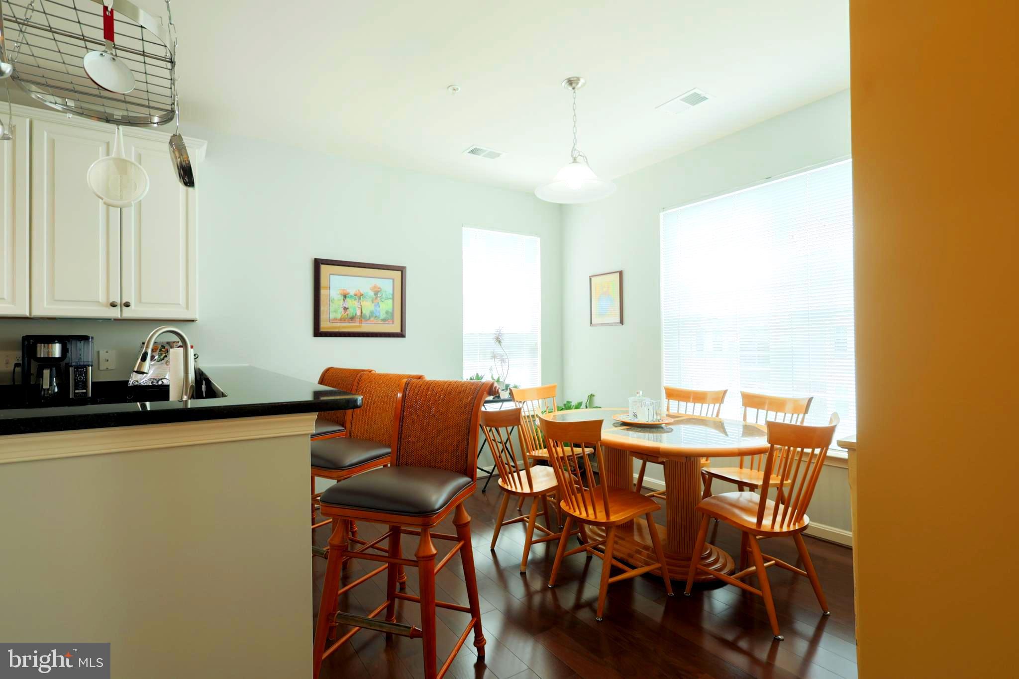 620 Quarry View Court, Unit 407 Reisterstown, MD 21136 - Photo 10 of 25 a dining room with furniture and window